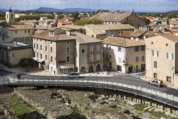 View over archaeological excavations and houses of the city Orange seen from the Ancient Theater, Provence-Alpes-Cote d'Azur, Vaucluse, France, Europe