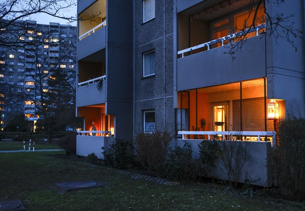 Illuminated balconies on a tower block in Gropiusstadt. The rise in rents in German cities increased again last year, Berlin, 16.01.2023