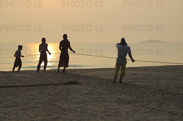 Traditional fishing hauling nets Nilavelli beach, near Trincomalee, Eastern province, Sri Lanka, Asia