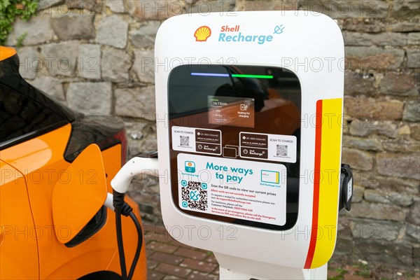 Shell Recharge electric car vehicle electrical charging point, Marlborough, Wiltshire, England, UK