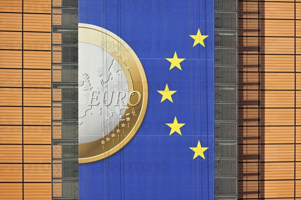 Banner about the euro hanging from the Berlaymont building of the European Commission, executive body of the European Union, Brussels, Belgium, Europe