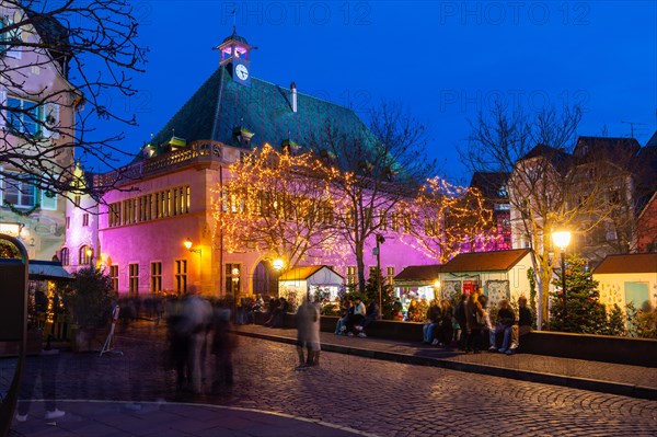 Historic houses with Christmas lights, Christmas decoration, Christmas market, historic town, people, blue hour, Colmar, Alsace, France, Europe