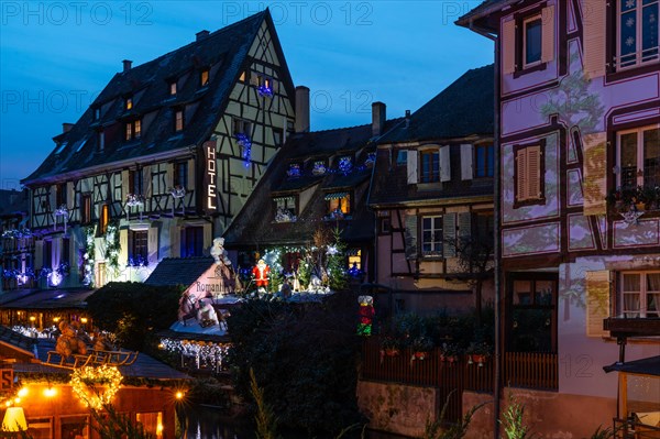 Historic houses with Quai de Poissonnerie, Little Venice, Petite Venise, Christmas decorations, Christmas market, historic town, Blue Hour, The Fisherman's Lane, Colmar, Alsace, France, Europe