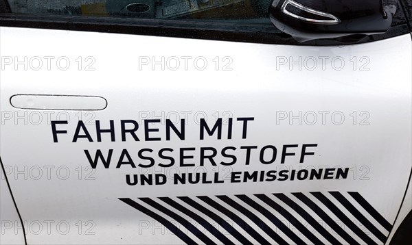 Hydrogen slogan Driving with hydrogen and zero emissions on a hydrogen-powered vehicle, Berlin, 11 January 2023