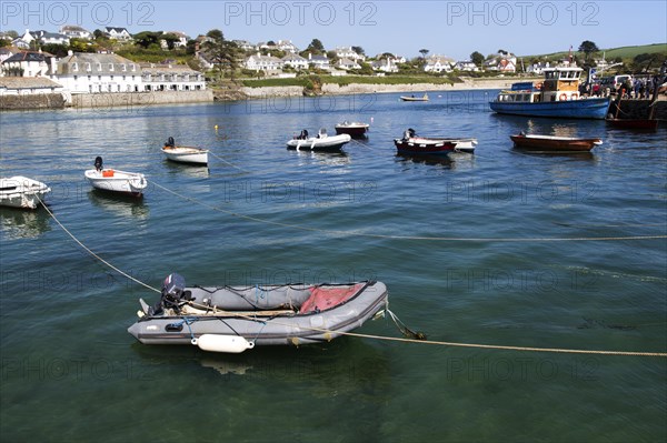 Ferry boat and dinghies in the harbour, St Mawes, Cornwall, England, UK