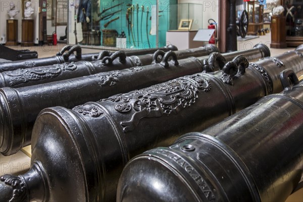 Collection of old 18th and 19th century muzzleloading black powder cannon barrels at the Royal Museum of the Army and of Military History in Brussels, Belgium, Europe