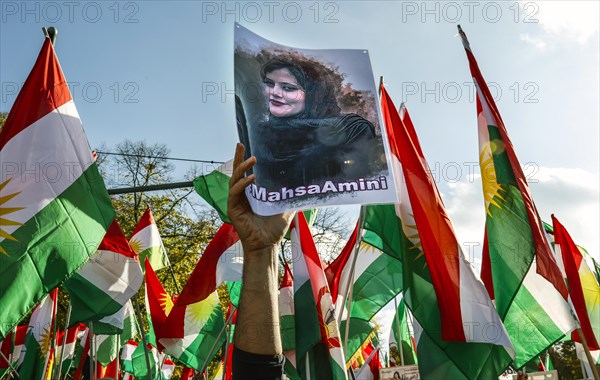 A picture of Mahsa Amini is shown at a demonstration in Berlin. Thousands of Iranians protest in support of the protests in Iran. The demonstration was called by the Woman Life Freedom Collective, Berlin, 22 October 2022
