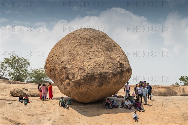 Indian tourists, Krishna's butterball, natural boulder, UNESCO World Heritage Site, Mahabalipuram or Mamallapuram, Tamil Nadu, India, Asia