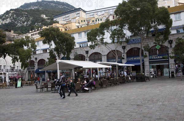 People and cafes in Grand Casemates Square, Gibraltar, British terroritory in southern Europe, Europe