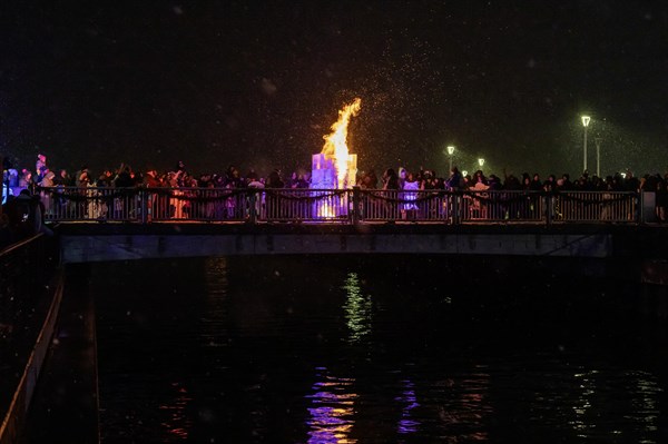 Detroit, Michigan, The Fire & Ice Festival on the Detroit Riverwalk featured ice carvings, one of which, and Ice Tower, was set on fire