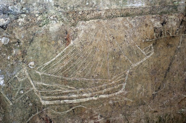 Old graffiti of galleon sailing ship carved on rampart wall of the citadel at Brouage, Hiers-Brouage, Charente-Maritime, France, Europe