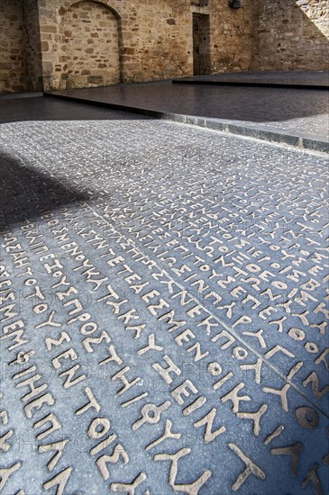 Detail of giant replica of the Rosetta Stone that allowed Jean-Francois Champollion to decipher the Egyptian hieroglyphs, Place des Ecritures, Figeac, Lot, Midi-Pyrenees, France, Europe