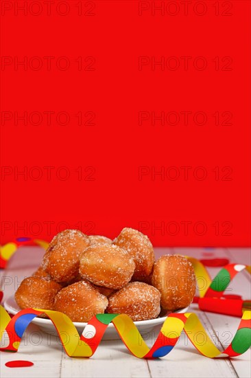 Traditional German 'Berliner Pfannkuchen', a donut without hole filled with jam served during carnival