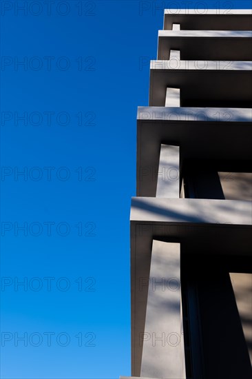 Corner Shape of a Modern Design Building Against Clear Blue Sky in a Sunny Day in Switzerland