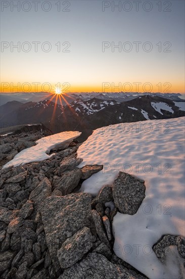 View of mountain panorama, sun star at sunset, summit of Skala, Loen, Norway, Europe