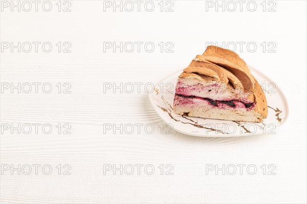Zephyr or marshmallow cake on white wooden background. side view, copy space