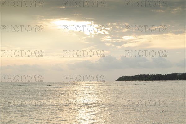 Lombok and Gili Air islands, overcast, cloudy day, sky and sea. Vacation, travel, tropics concept, no people. Sunset, sand beach