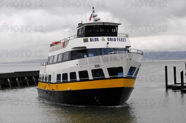 Excursion boat with Alcatraz former prison island, San Francisco, California, USA, North America