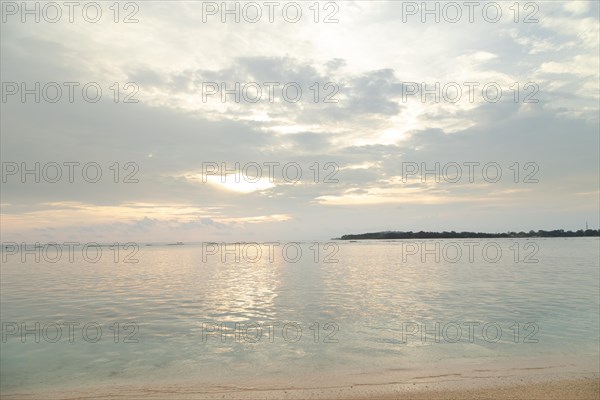 Lombok and Gili Air islands, overcast, cloudy day, sky and sea. Vacation, travel, tropics concept, no people. Sunset, sand beach