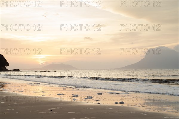 Bako national park, sea sandy beach, overcast, cloudy sunset, sky and sea, low tide. Vacation, travel, tropics concept, no people, Malaysia, Kuching, Asia