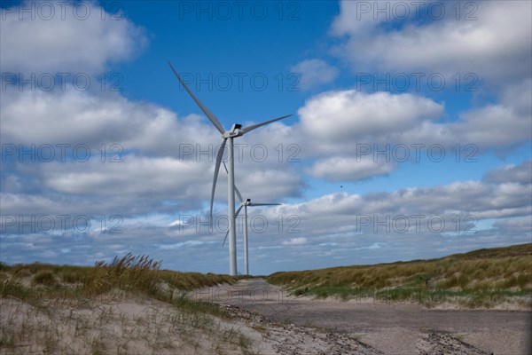 Wind turbines on the beach at Hvide Sande, West Jutland, Denmark, Europe