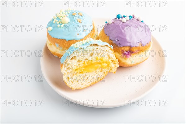 Purple and blue glazed donut isolated on white background. side view. Breakfast, morning, concept