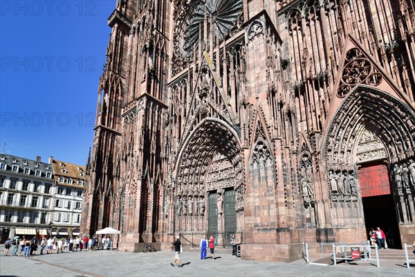 Strasbourg, France, September 2023: Entrance door of famous Strasbourg Cathedral in France in Romanesque and gothic architecture style, Europe