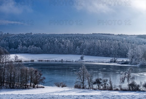 Frozen retention basin in Spindelwag, Rot an der Rot, Baden-Wuerttemberg, Germany, Europe