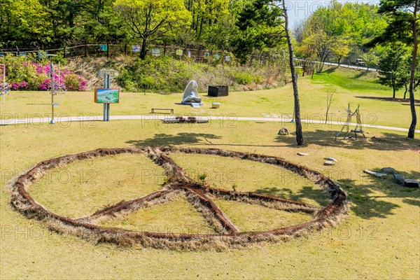 Sculpture: Peace, by Victor Choi, made of rusted metal at DMZ Peace Park in Goseong, South Korea, Asia