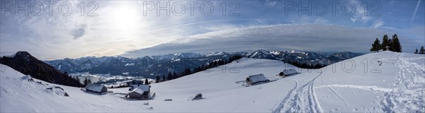 Winter mood, snow-covered landscape, snow-covered alpine peaks, view from the Schafbergalm to Lake Wolfgangsee, panoramic shot, near St. Wolfgang am Wolfgangsee, Salzkammergut, Upper Austria, Austria, Europe