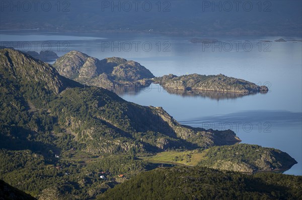 Coast in atmospheric evening light, view from the top of Dronningsvarden or Stortinden, Ulvagsundet, Vesteralen, Norway, Europe