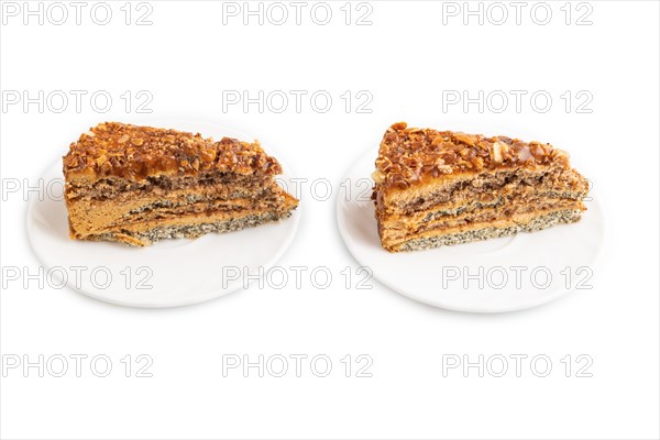 Walnut and hazelnut cake with caramel cream isolated on white background. side view