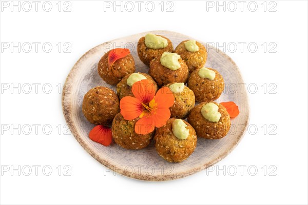 Falafel with guacamole isolated on white. Side view, close up