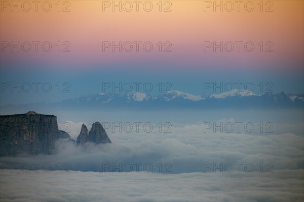Sea of fog with Dolomite peaks in the background at blue hour, Corvara, Dolomites, Italy, Europe