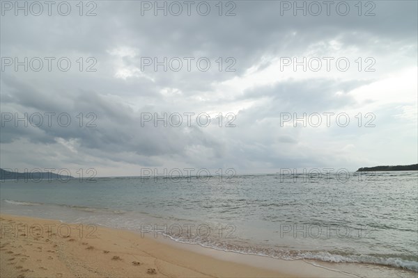 Lombok and Gili Air islands, overcast, cloudy day, sky and sea. Vacation, travel, tropics concept, no people. Sunset, sand beach