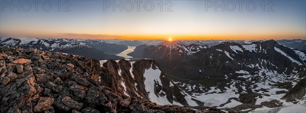 Panorama, view of mountains and fjord Faleidfjorden, sun star at sunset, summit of Skala, Loen, Norway, Europe