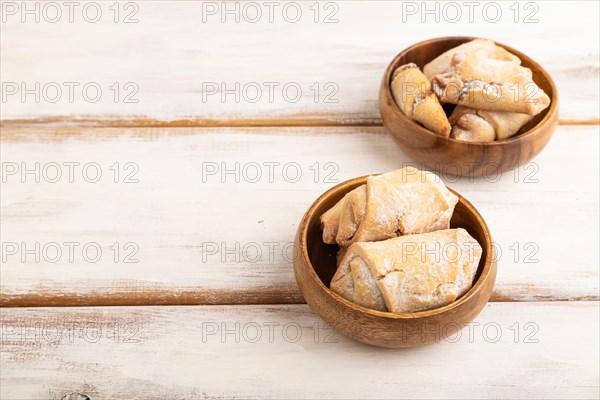 Homemade sweet cookie with apple jam on white wooden background. side view, copy space