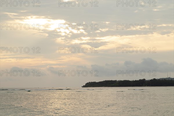 Lombok and Gili Air islands, overcast, cloudy day, sky and sea. Vacation, travel, tropics concept, no people. Sunset, sand beach