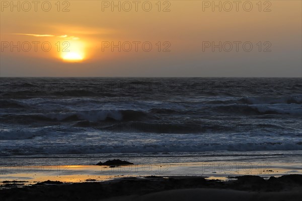 Sunset on the beach at Morro Bay, Pacific Ocean, California, USA, North America
