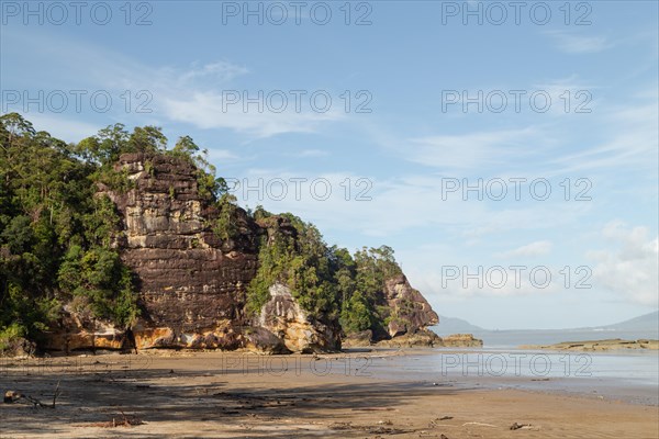 Cliff in Bako national park, sunny day, blue sky and sea. Vacation, travel, tropics concept, no people, Malaysia, Kuching, Asia