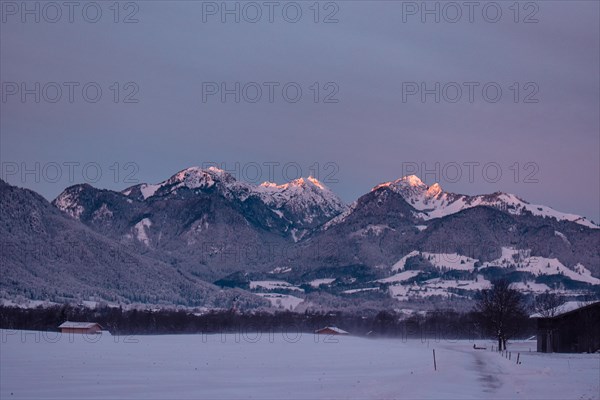 Snowy landscape at sunrise with mountain panorama, view of Wendelstein, Nussdorf, Bavaria, Germany, Europe