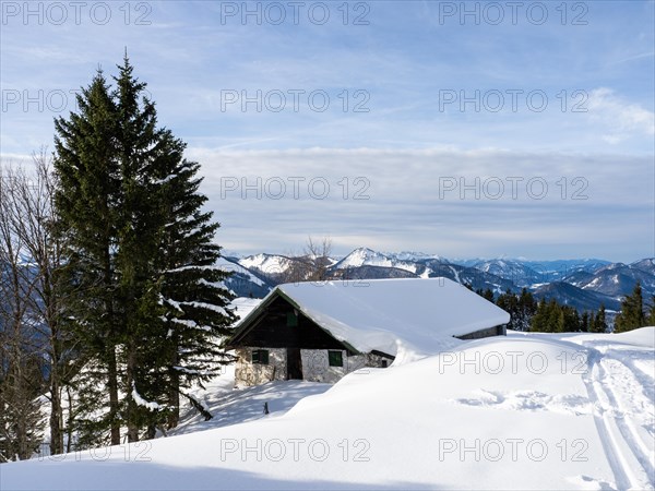 Winter atmosphere, snow-covered landscape, snow-covered alpine peaks, alpine hut on the Schafbergalm, near St. Wolfgang am Wolfgangsee, Salzkammergut, Upper Austria, Austria, Europe
