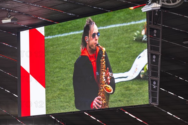 Saxophonist Noah fisherman plays at the memorial service, funeral service of FC Bayern Munich for Franz Beckenbauer, Allianz Arena, Froettmaning, Munich, Upper Bavaria, Bavaria