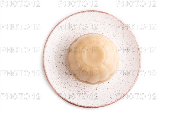 Buckwheat milk jelly isolated on white background. top view, flat lay