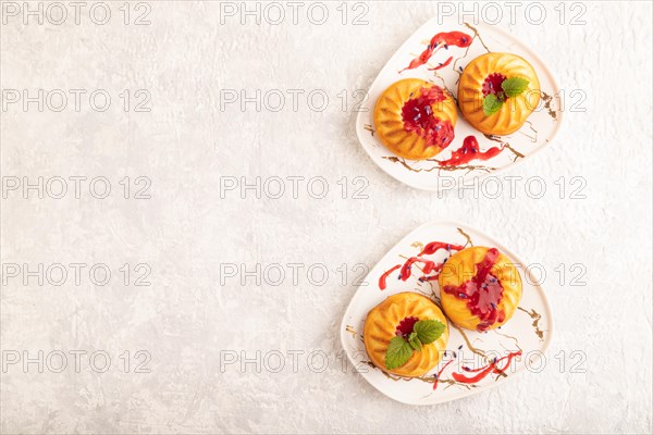 Semolina cheesecake with strawberry jam, lavender on gray concrete background. top view, flat lay, copy space