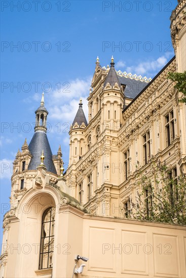 Castle lake facade of Schwerin Castle with towers and roofs, in the foreground the west bastion, Schwerin, Mecklenburg-Western Pomerania, Germany, Europe