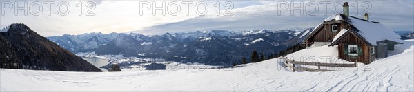 Winter mood, snow-covered landscape, snow-covered alpine peaks, view from the Schafbergalm to Lake Wolfgangsee, panoramic shot, near St. Wolfgang am Wolfgangsee, Salzkammergut, Upper Austria, Austria, Europe