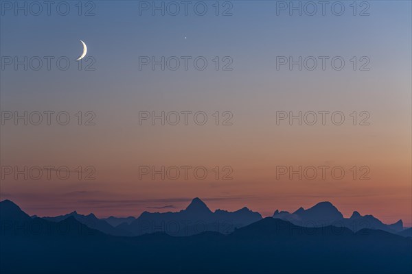 Mountain range at dusk with crescent moon, summer, Allgaeu Alps, Allgaeu, Germany, Europe