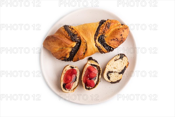 Homemade sweet bun with strawberry jam isolated on white background. top view, flat lay, close up