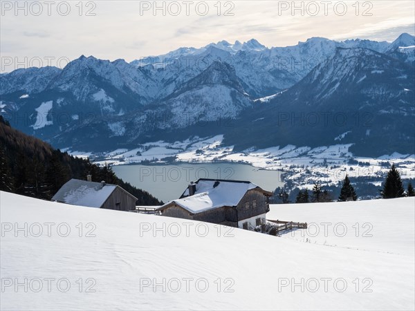 Winter mood, snow-covered landscape, snow-covered alpine peaks, view from the Schafbergalm to Lake Wolfgangsee, near St. Wolfgang am Wolfgangsee, Salzkammergut, Upper Austria, Austria, Europe